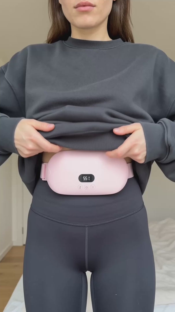 Ceinture chauffante portée devant et dans le dos